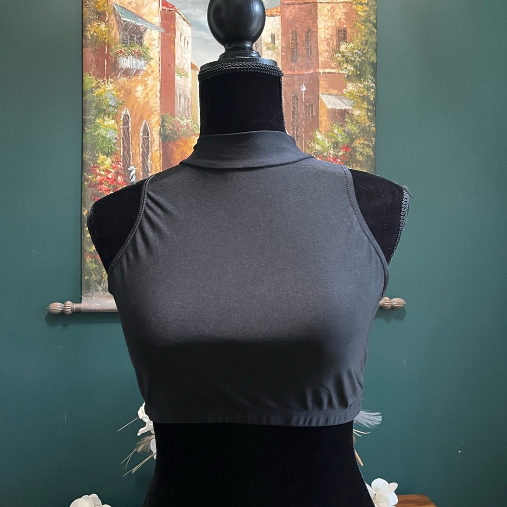 Black Sleeveless Crop Top
By IEFIEL in a size Adult Medium
